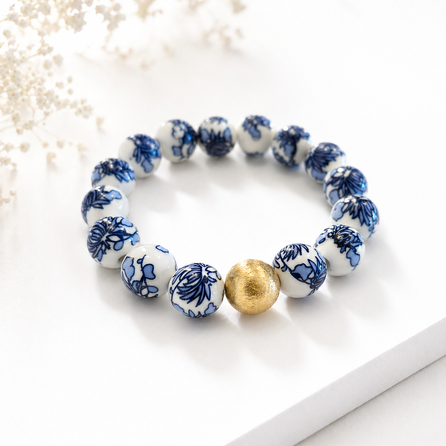 The Camille Chinoiserie Painted Bead Stretchy Bracelet with Brushed Gold Ball - Blue Two Tone Colorway