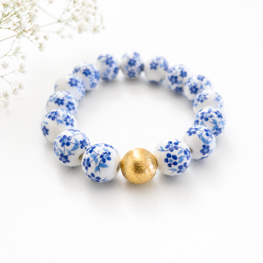 The Camille Chinoiserie Painted Bead Stretchy Bracelet with Brushed Gold Ball - Blue Two Tone Colorway
