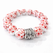 The Camille Chinoiserie Painted Bead Stretchy Bracelet with Brushed Gold Ball - Red
