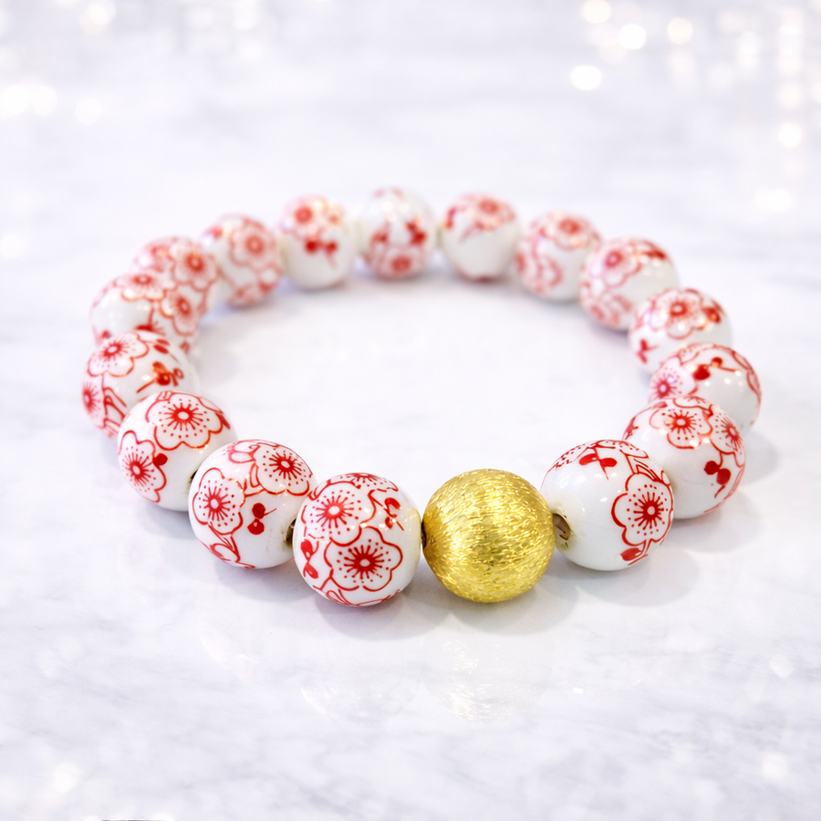 The Camille Chinoiserie Painted Bead Stretchy Bracelet with Brushed Gold Ball - Red