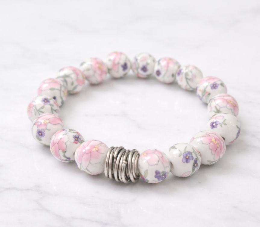 The Camille Chinoiserie Painted Bead Stretchy Bracelet with Brushed Gold Ball - Pink & Lilac Floral