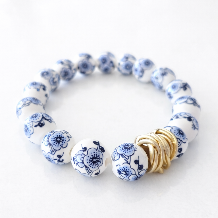 The Camille Chinoiserie Painted Bead Stretchy Bracelet with Brushed Gold Ball - Blue Two Tone Colorway