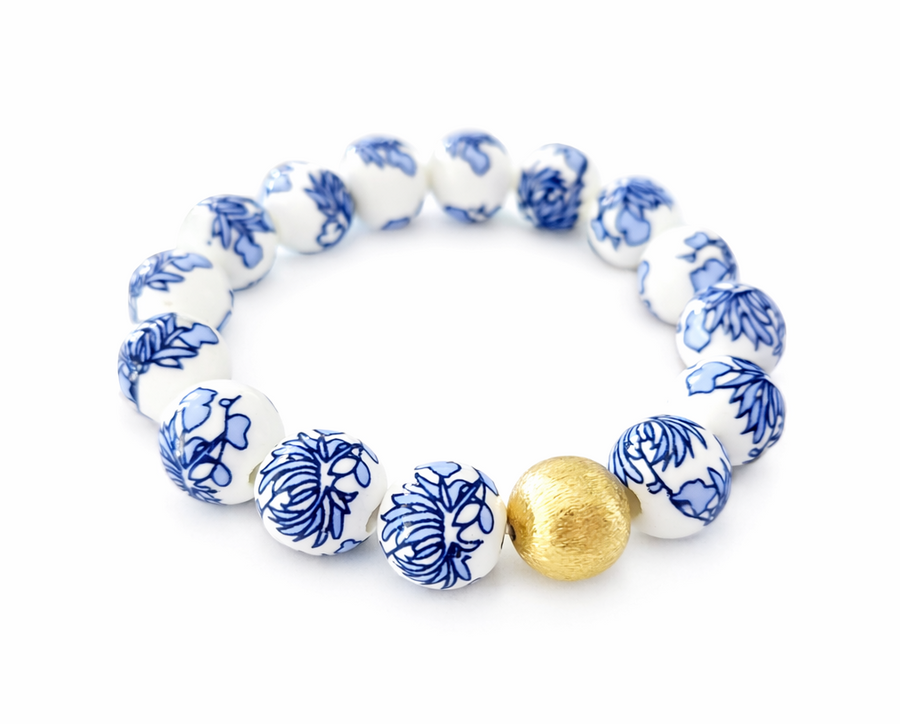The Camille Chinoiserie Painted Bead Stretchy Bracelet with Brushed Gold Ball - Blue Two Tone Colorway