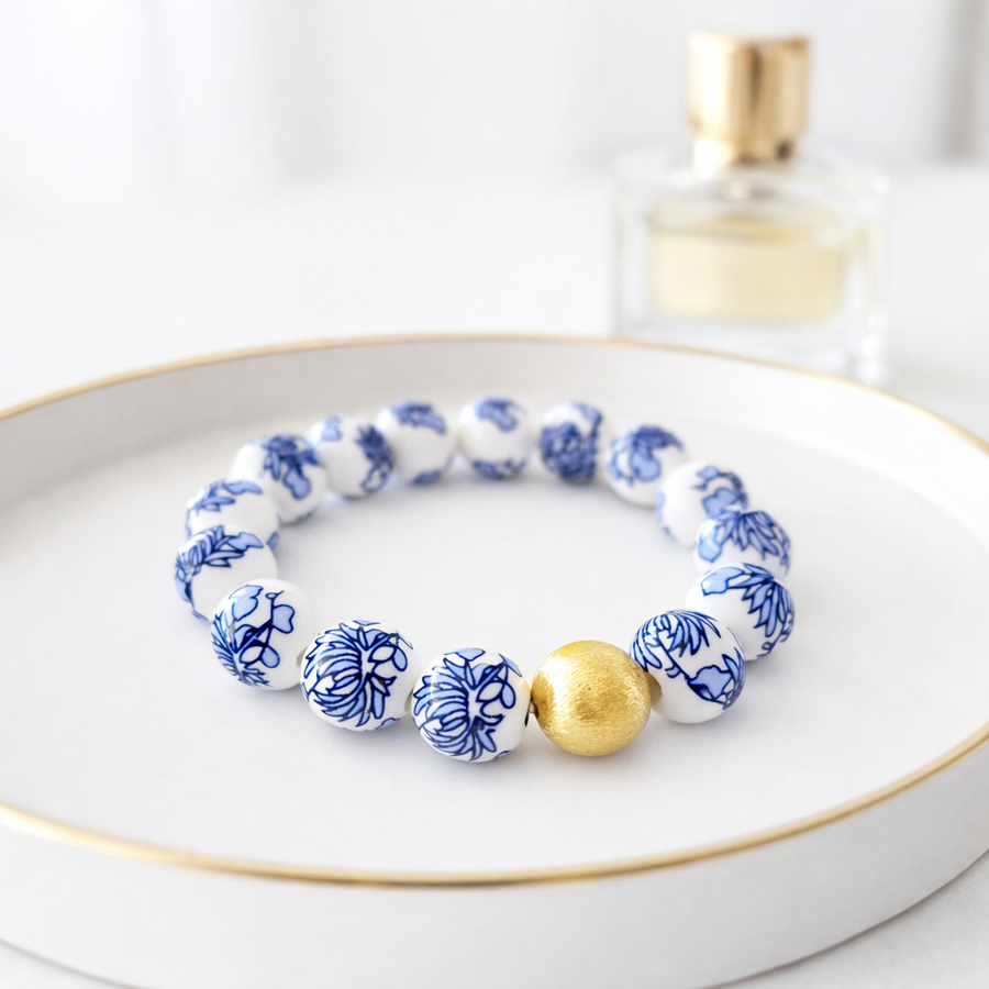 The Camille Chinoiserie Painted Bead Stretchy Bracelet with Brushed Gold Ball - Blue Two Tone Colorway
