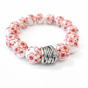 The Camille Chinoiserie Painted Bead Stretchy Bracelet with Brushed Gold Ball - Red