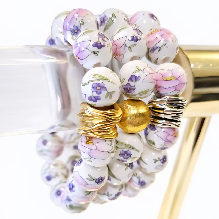 The Camille Chinoiserie Painted Bead Stretchy Bracelet with Brushed Gold Ball - Pink & Lilac Floral
