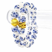 The Camille Chinoiserie Painted Bead Stretchy Bracelet with Brushed Gold Ball - Blue Two Tone Colorway