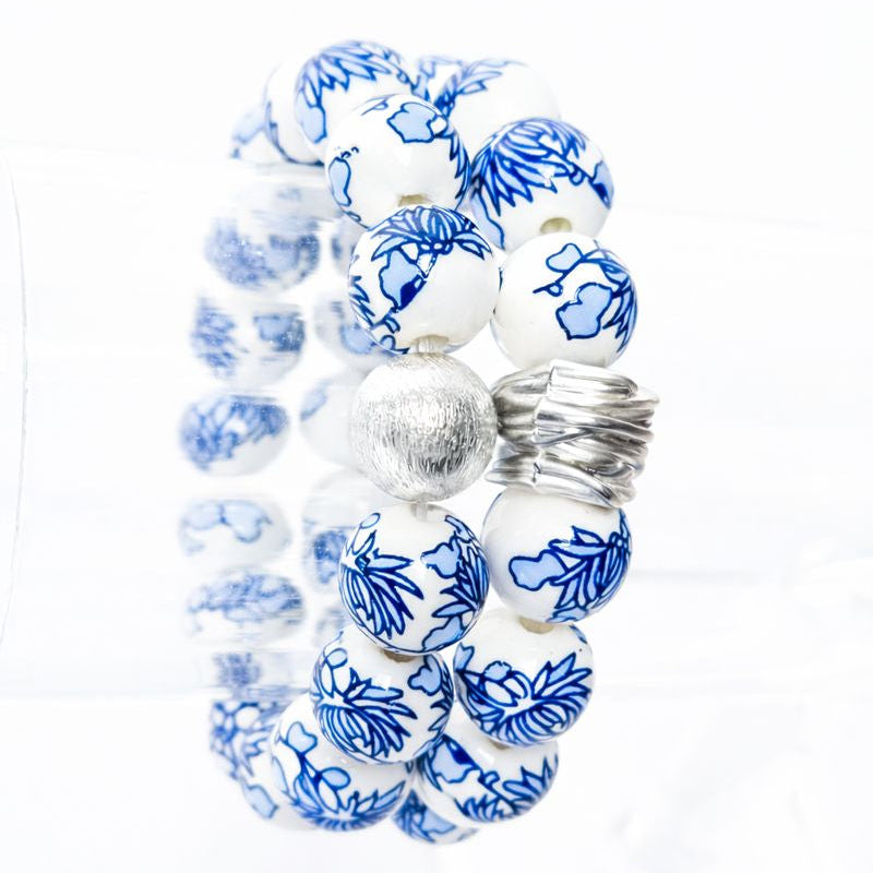 The Camille Chinoiserie Painted Bead Stretchy Bracelet with Brushed Gold Ball - Blue Two Tone Colorway