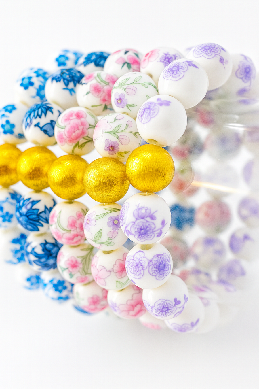 The Camille Chinoiserie Painted Bead Stretchy Bracelet with Brushed Gold Ball - Blue Two Tone Colorway