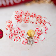 The Camille Chinoiserie Painted Bead Stretchy Bracelet with Brushed Gold Ball - Red