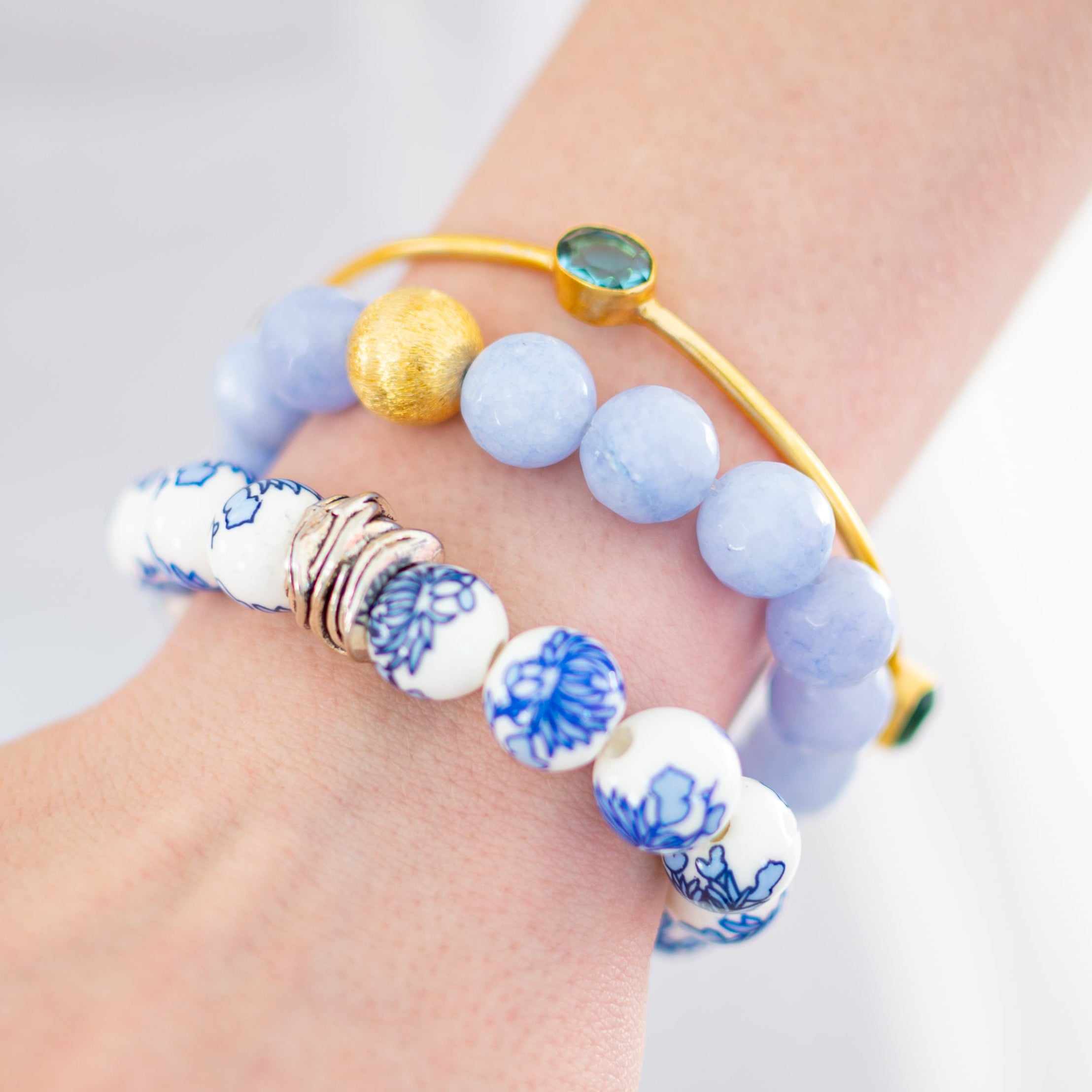 The Camille Chinoiserie Painted Bead Stretchy Bracelet with Brushed Gold Ball - Blue Two Tone Colorway
