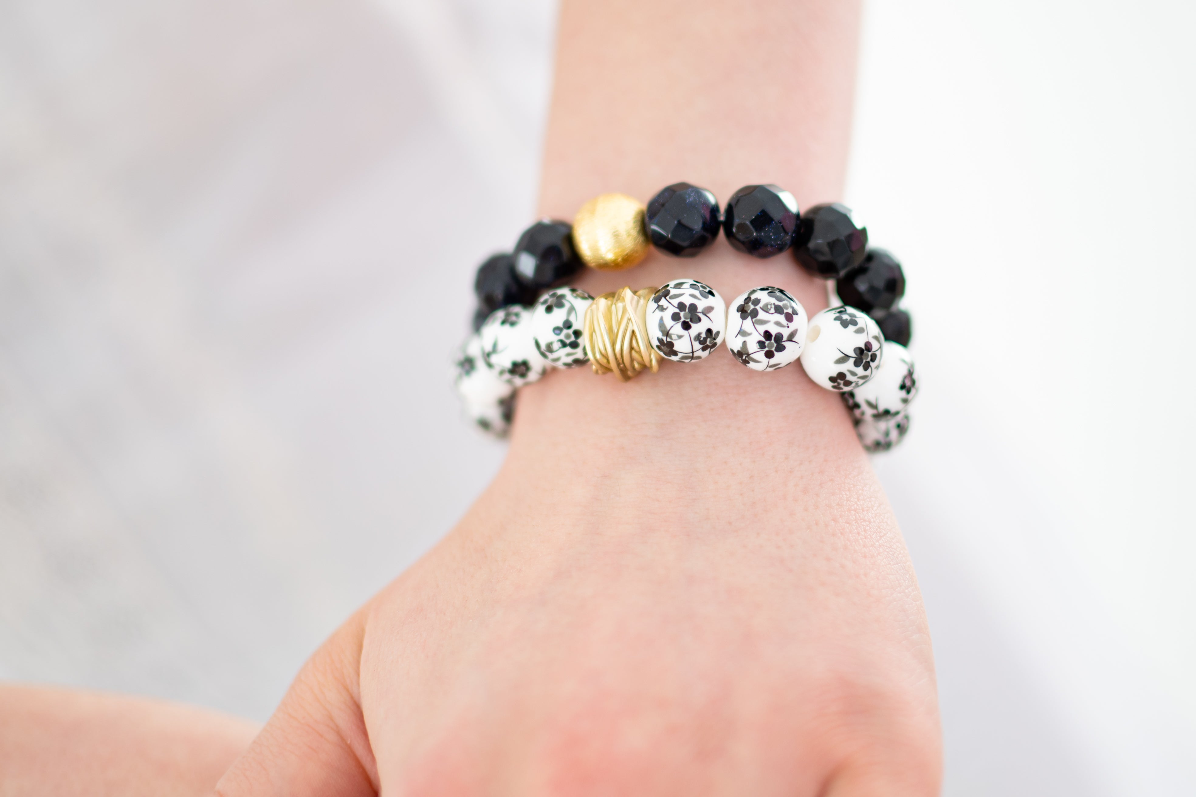 The Camille Chinoiserie Painted Bead Stretchy Bracelet with Brushed Gold Ball - Black