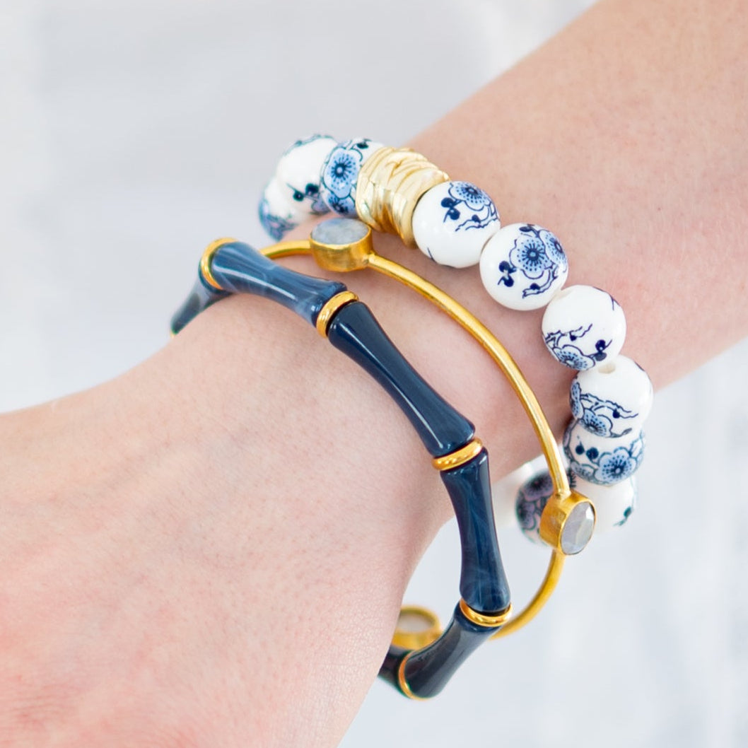 The Camille Chinoiserie Painted Bead Stretchy Bracelet with Brushed Gold Ball - Blue Two Tone Colorway