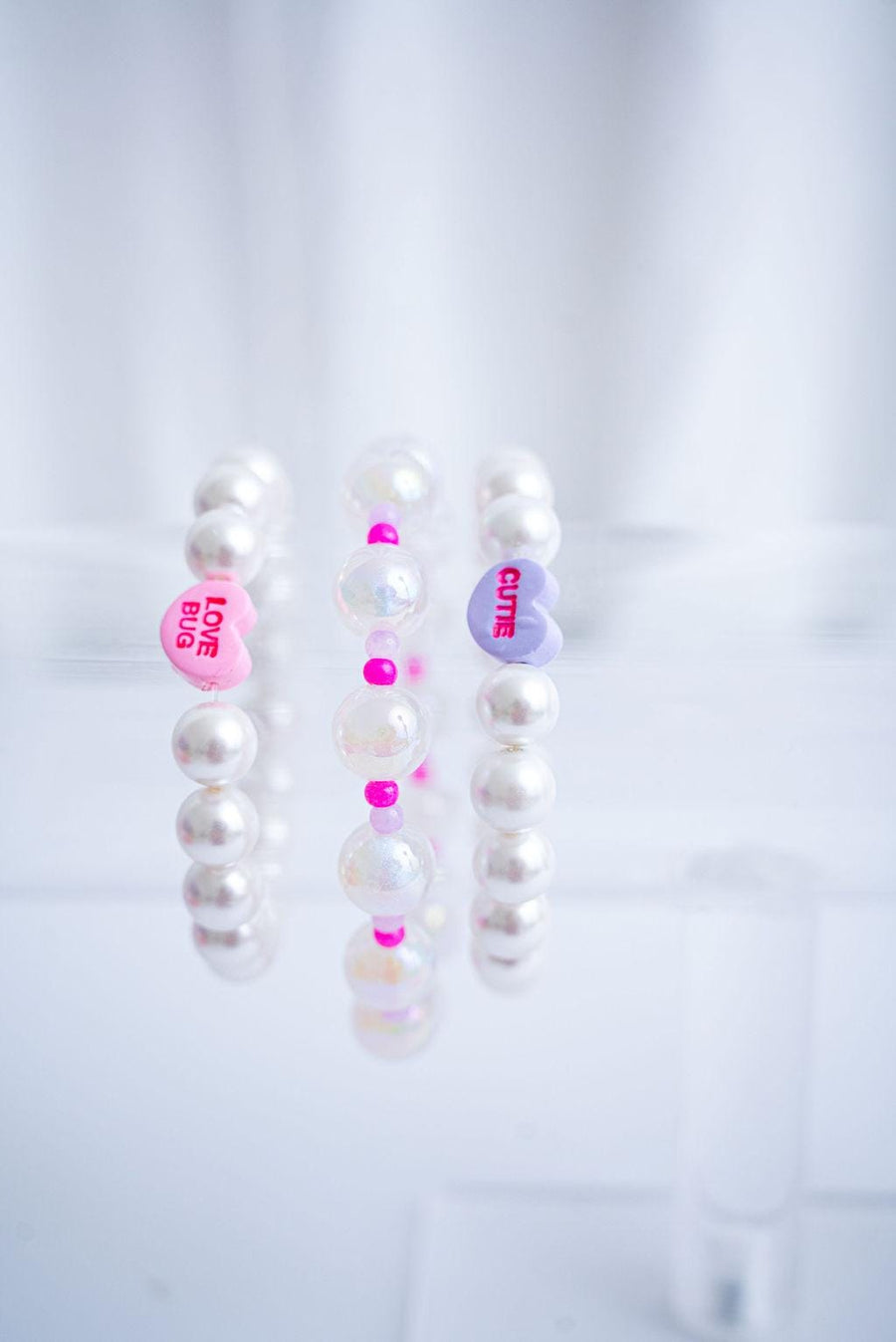 The Falling for You Valentine's Candy Conversation and Shell Pearl Bracelet Stack