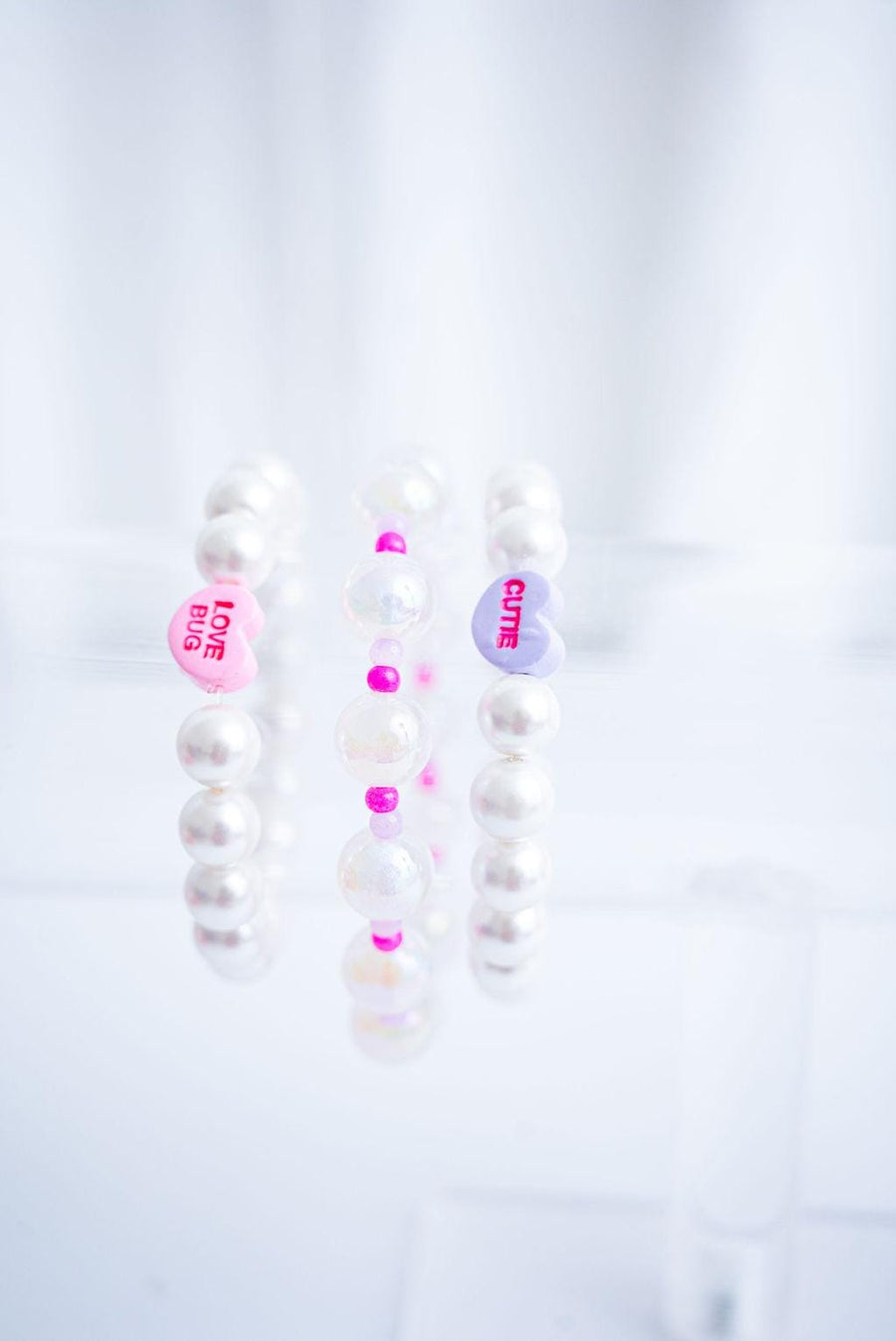 The Falling for You Valentine's Candy Conversation and Shell Pearl Bracelet Stack