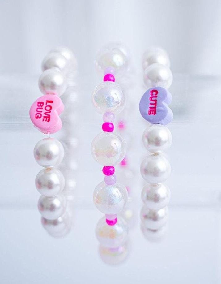The Falling for You Valentine's Candy Conversation and Shell Pearl Bracelet Stack