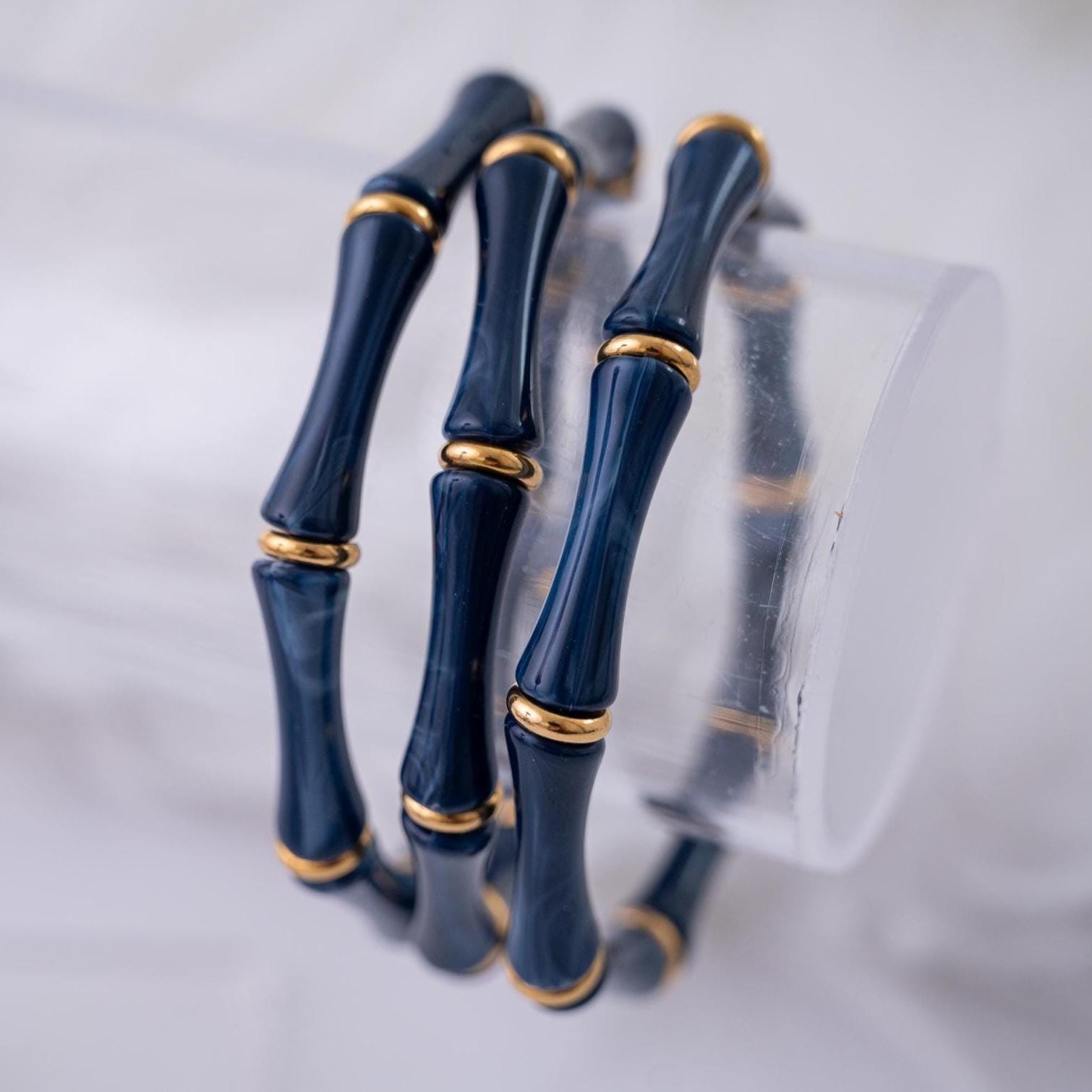 The Thin Bridgette Bamboo Acrylic Bangle Set in Marbled Navy (in Gold or Silver)