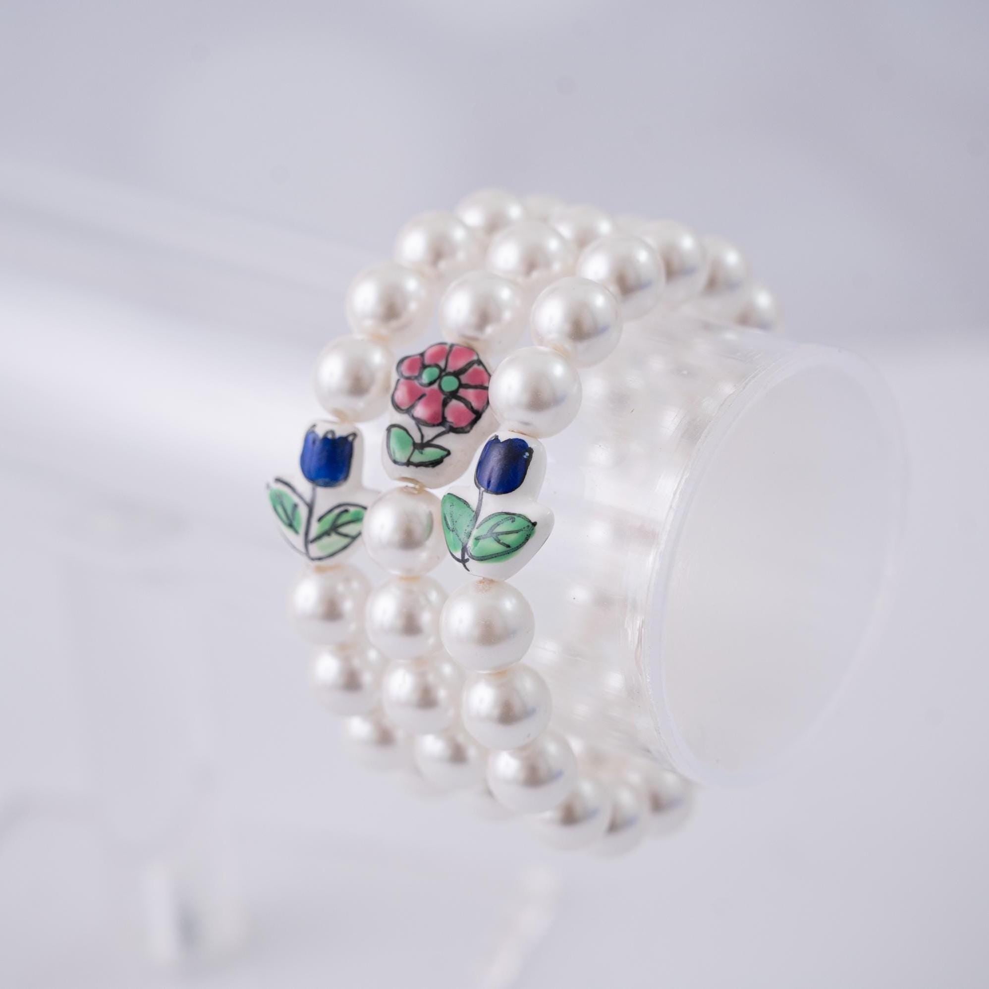 The Tulip Tea Time Stretchy Pearl Bracelet - Navy Blue Flower