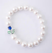 The Tulip Tea Time Stretchy Pearl Bracelet - Navy Blue Flower