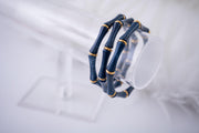 The Thin Bridgette Bamboo Acrylic Bangle Set in Marbled Navy (in Gold or Silver)