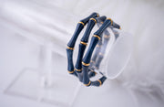 The Thin Bridgette Bamboo Acrylic Bangle Set in Marbled Navy (in Gold or Silver)