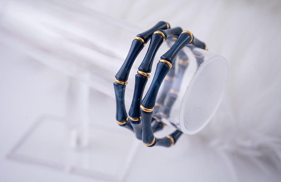 The Thin Bridgette Bamboo Acrylic Bangle Set in Marbled Navy (in Gold or Silver)