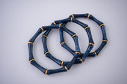 The Thin Bridgette Bamboo Acrylic Bangle Set in Marbled Navy (in Gold or Silver)