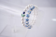 The Tulip Tea Time Stretchy Pearl Bracelet - Navy Blue Flower