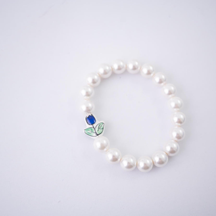 The Tulip Tea Time Stretchy Pearl Bracelet - Navy Blue Flower