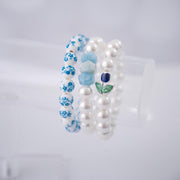 The Tulip Tea Time Stretchy Pearl Bracelet - Navy Blue Flower