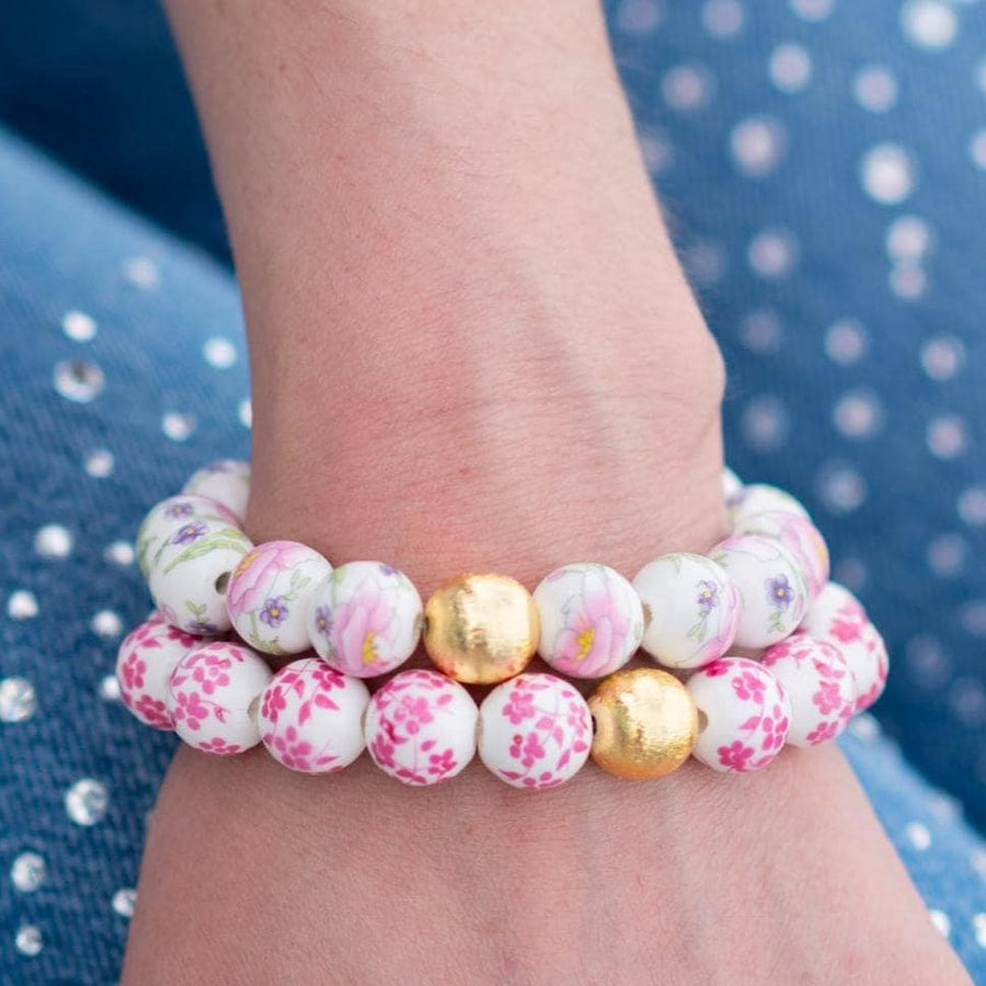 The Camille Chinoiserie Painted Bead Stretchy Bracelet with Brushed Gold Ball - Pink & Lilac Floral
