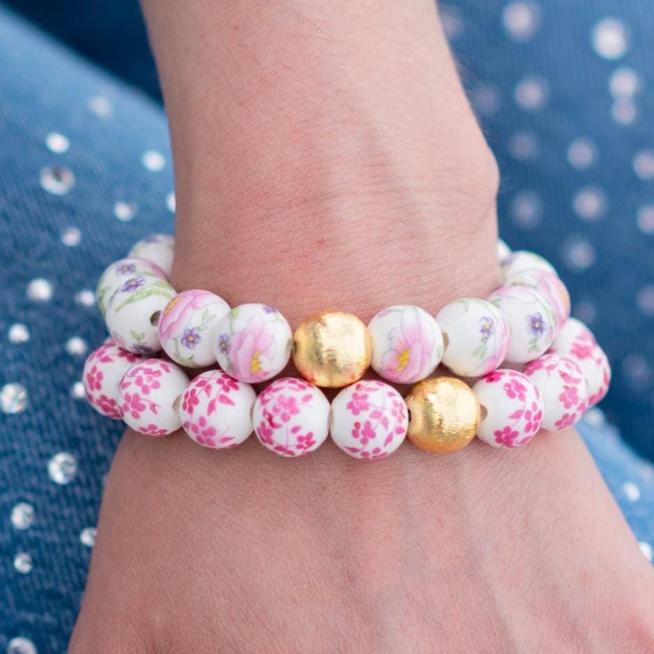 The Camille Chinoiserie Painted Bead Stretchy Bracelet with Brushed Gold Ball - Dark Pink Floral