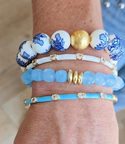The Camille Chinoiserie Painted Bead Stretchy Bracelet with Brushed Gold Ball - Blue Two Tone Colorway