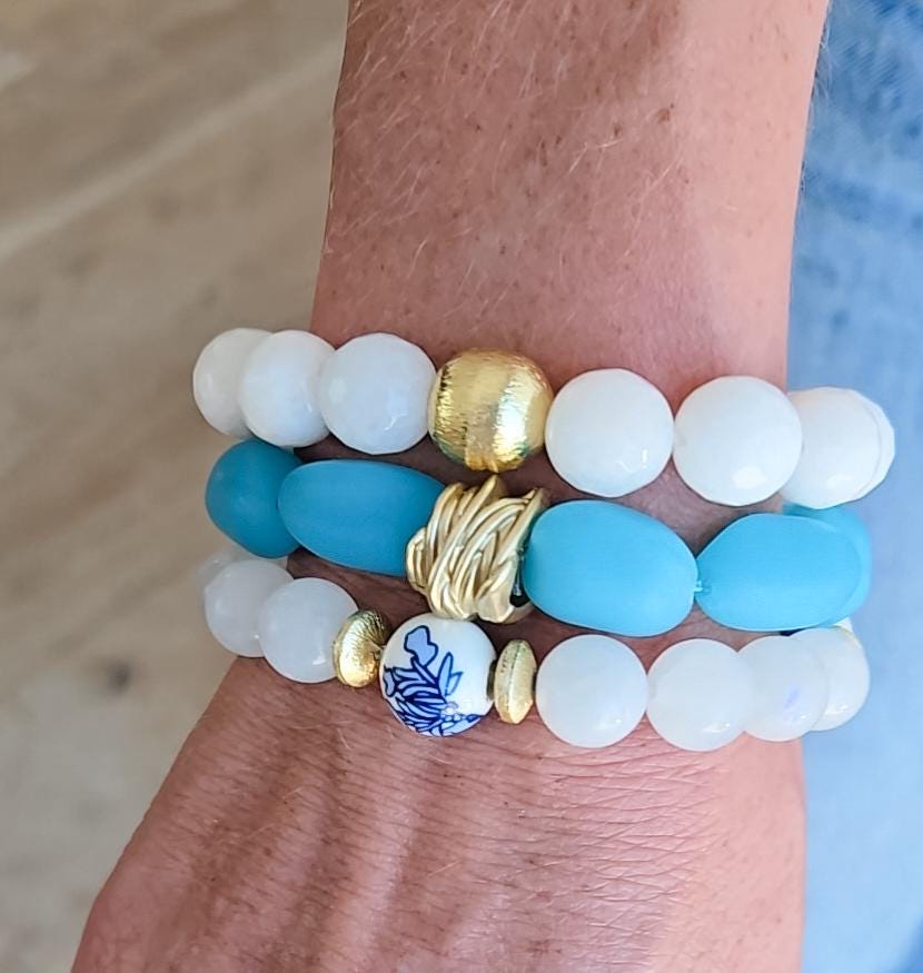 The Alouette White Stone Bead Stretchy Bracelet with Brushed Gold Ball