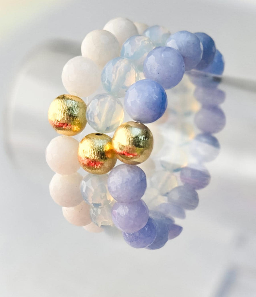 The Alouette Blue Stone Bead Stretchy Bracelet with Brushed Gold Ball
