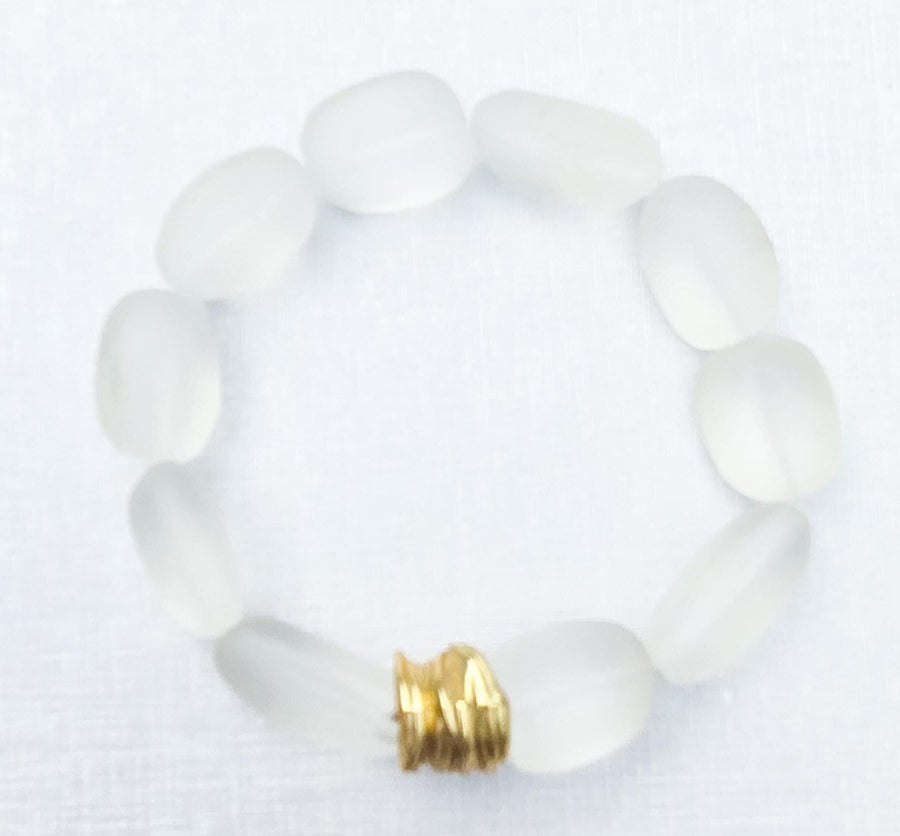 The Saige Sea Glass Bracelet with Gold Center Bead in Clear Matte