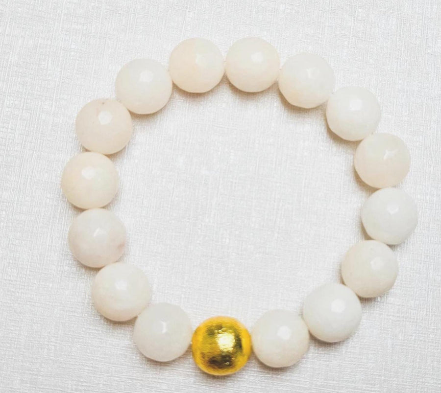 The Alouette White Stone Bead Stretchy Bracelet with Brushed Gold Ball