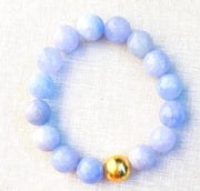 The Alouette Blue Stone Bead Stretchy Bracelet with Brushed Gold Ball