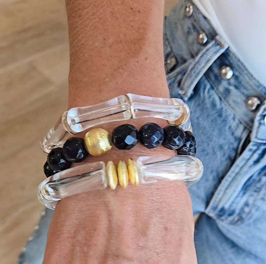 The Alouette Black Stone Bead Stretchy Bracelet with Brushed Gold Ball