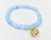 The Alice Blue Stone Bracelet with Gold Plated Seashell Charm with Zircon Diamond