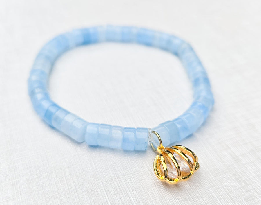 The Alice Blue Stone Bracelet with Gold Plated Seashell Charm with Zircon Diamond