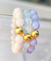 The Alouette Blue Stone Bead Stretchy Bracelet with Brushed Gold Ball