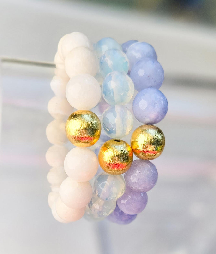 The Alouette Blue Stone Bead Stretchy Bracelet with Brushed Gold Ball