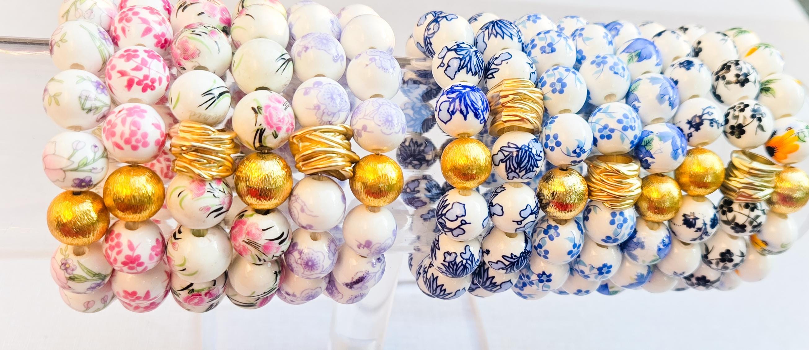 The Camille Chinoiserie Painted Bead Stretchy Bracelet with Brushed Gold Ball - Black Floral