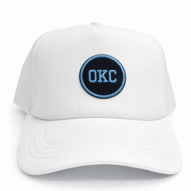 White cap with 'OKC' logo on a white background